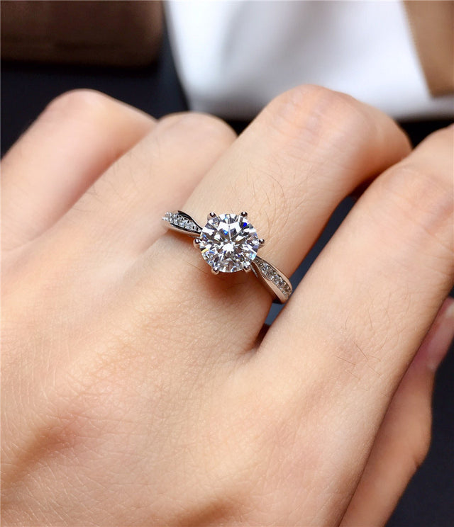 Solitaire Moissanite in 18K White Gold Ring