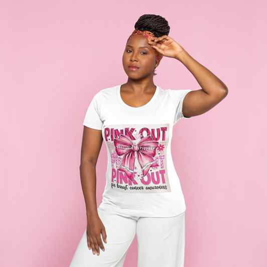 Woman wearing a 'Pink Out' t-shirt against a pink background